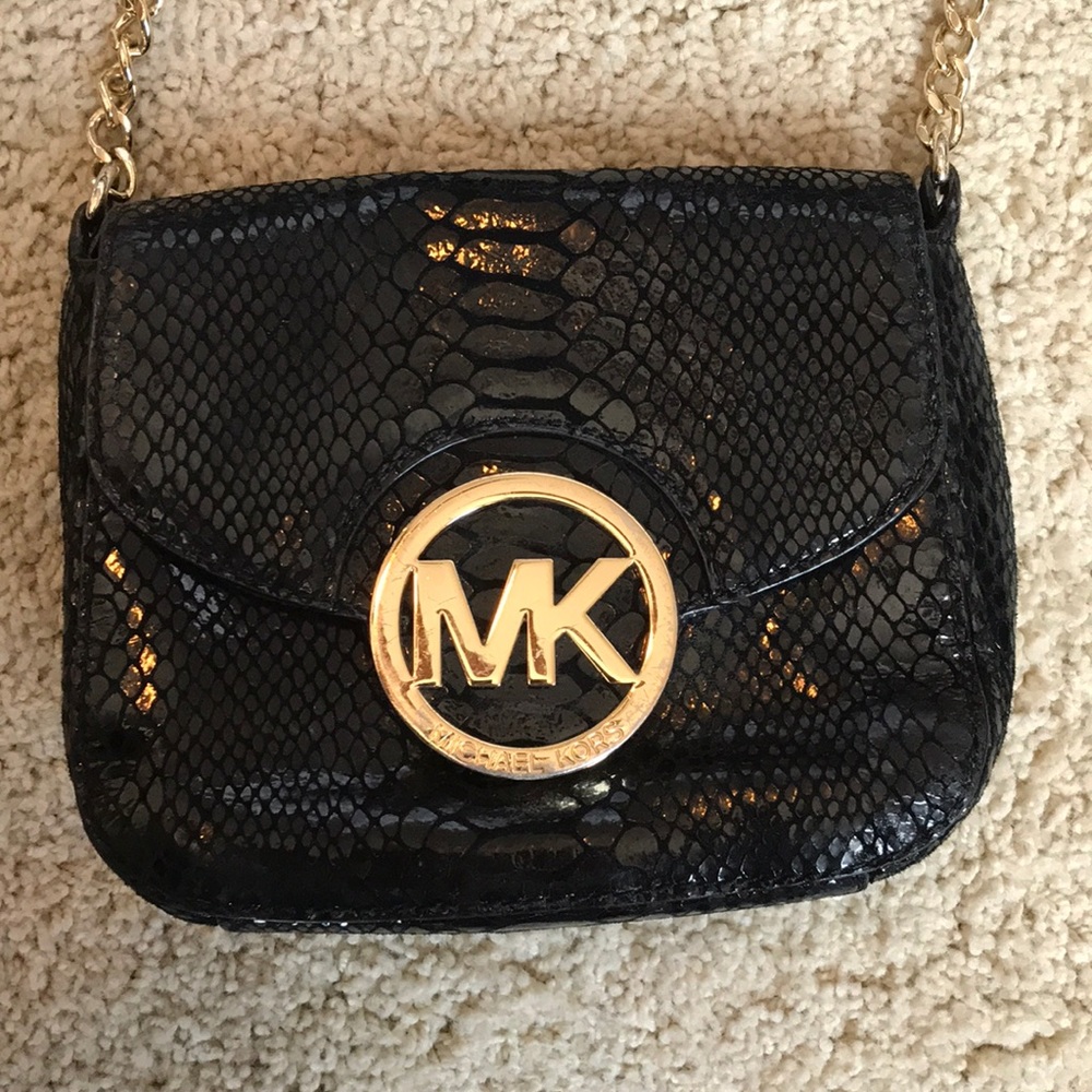 Black snakeskin Michael Kors crossbody purse